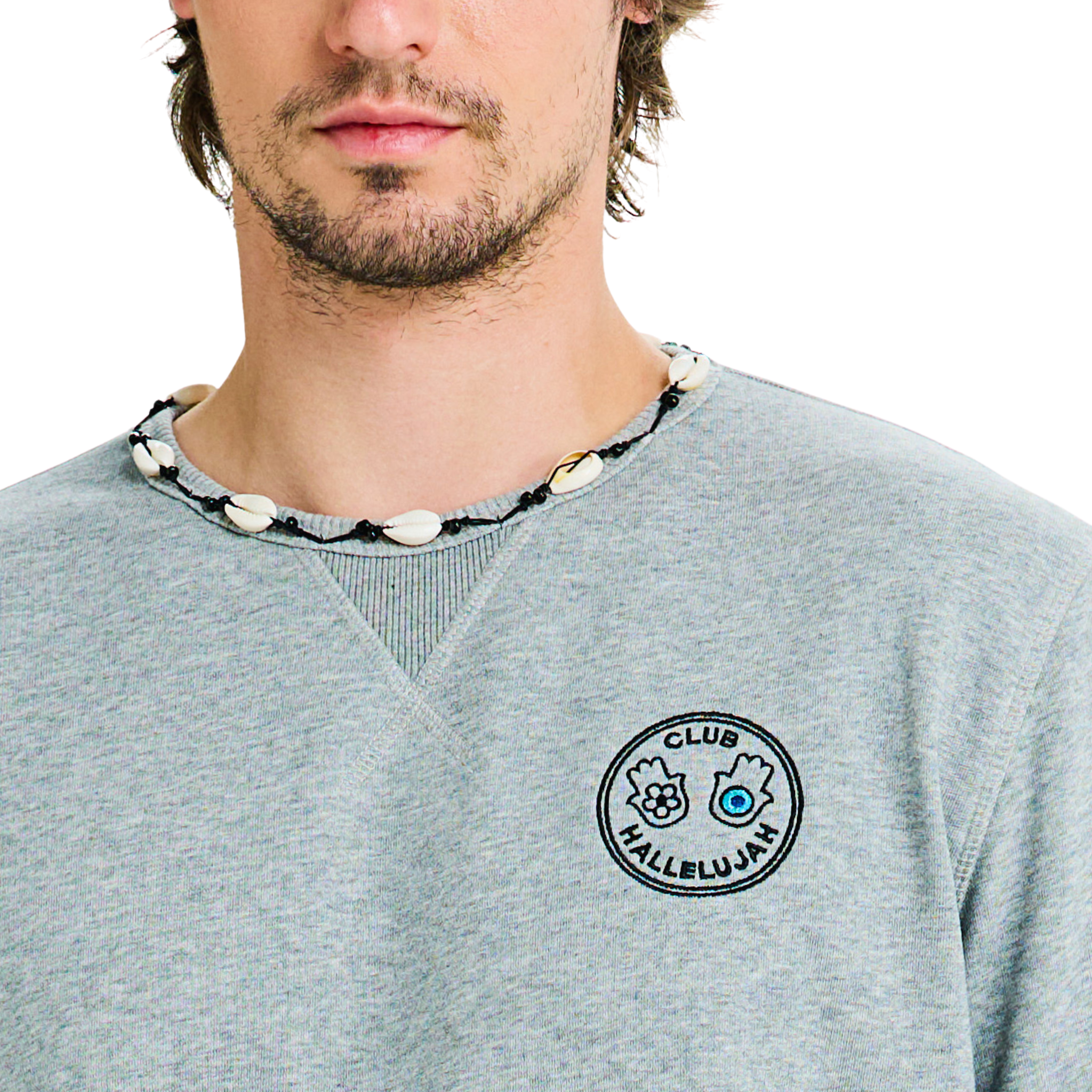 Close-up of embroidered logo on chest and handmade braided shell neckline on grey mélange sweatshirt