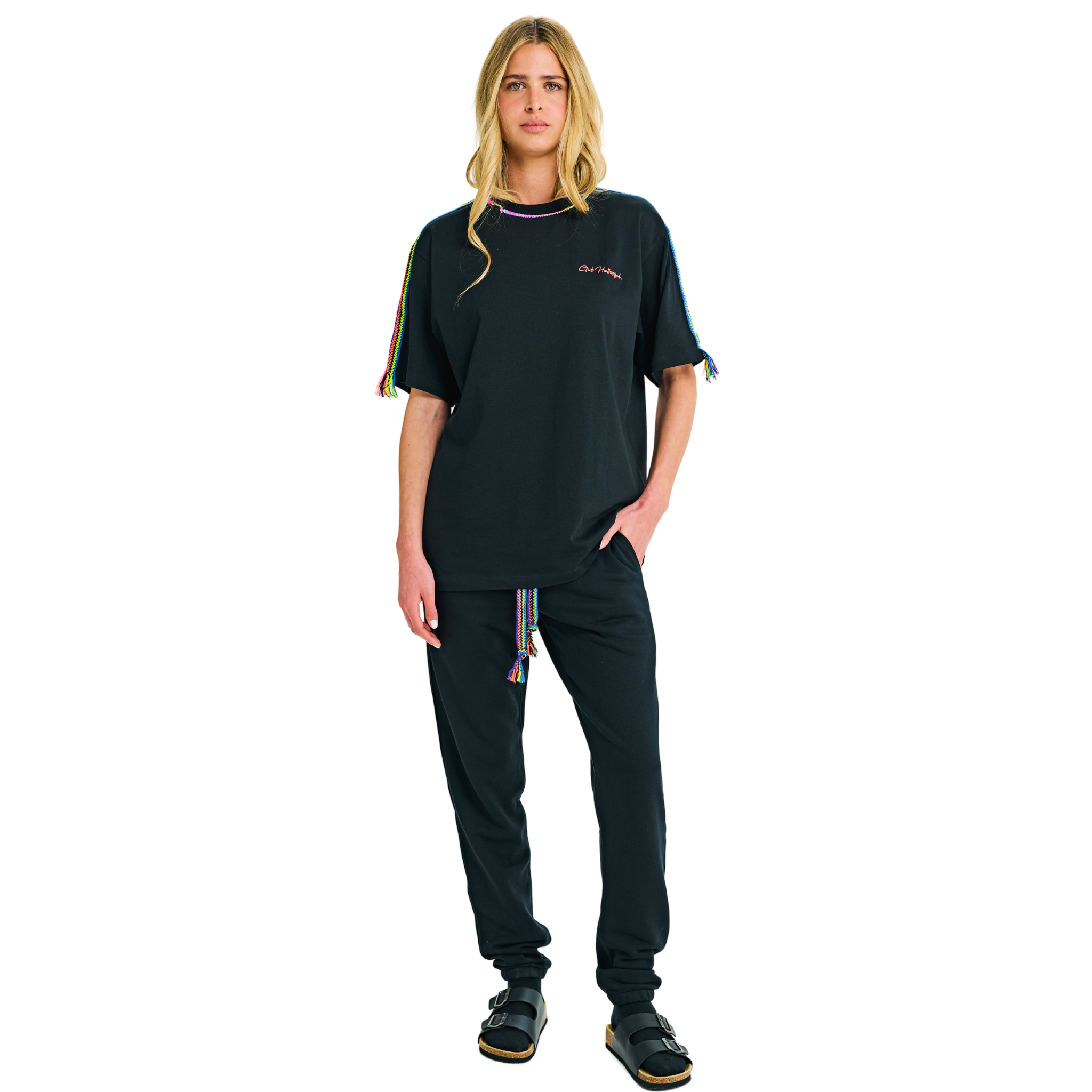 Female model front view wearing black oversized T-shirt with embroidered logo and handmade braided shoulders