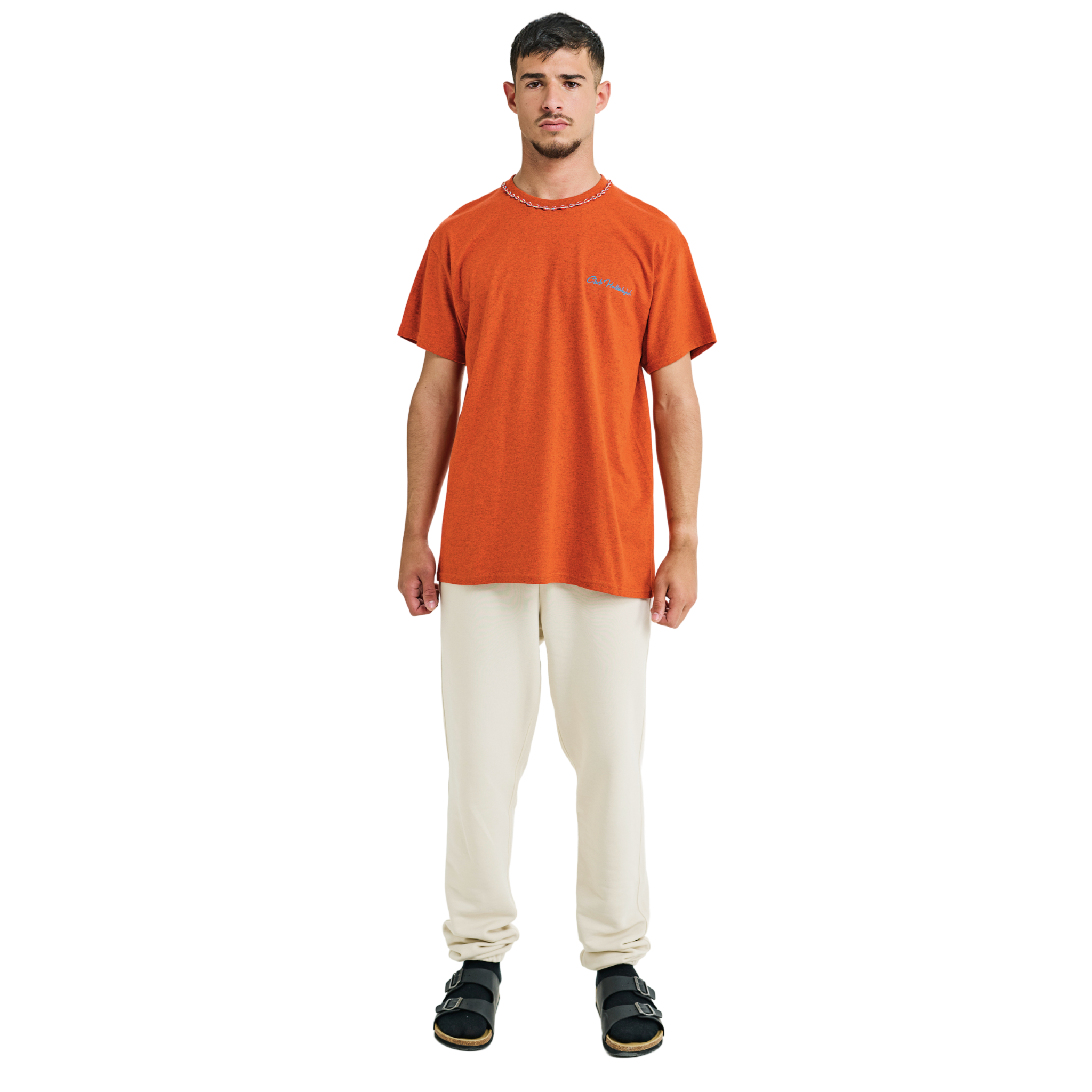 Male model wearing orange mélange T-shirt with small front logo and braided neckline, front view