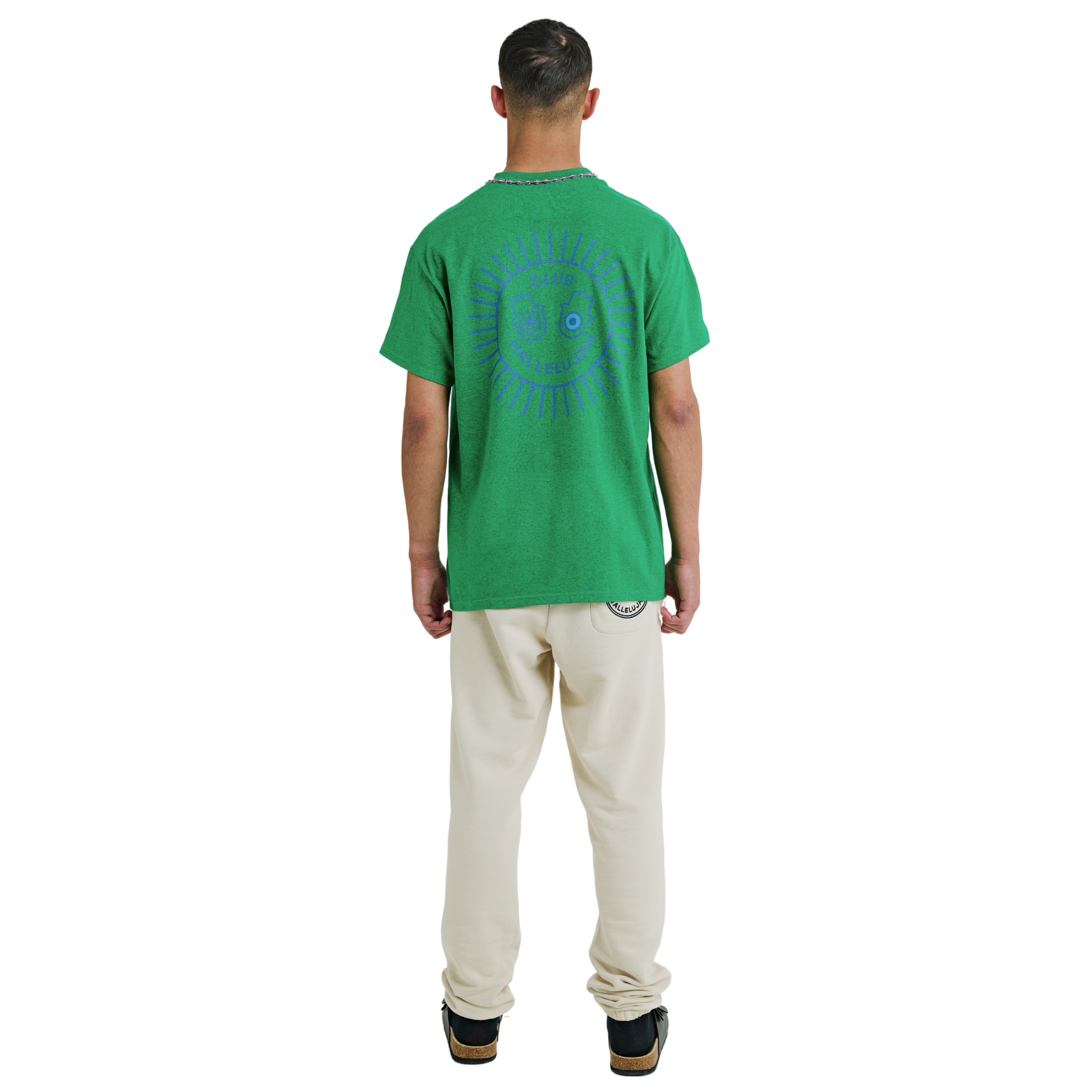 Male model wearing green mélange T-shirt, back view, showing sunburst print and braided neckline