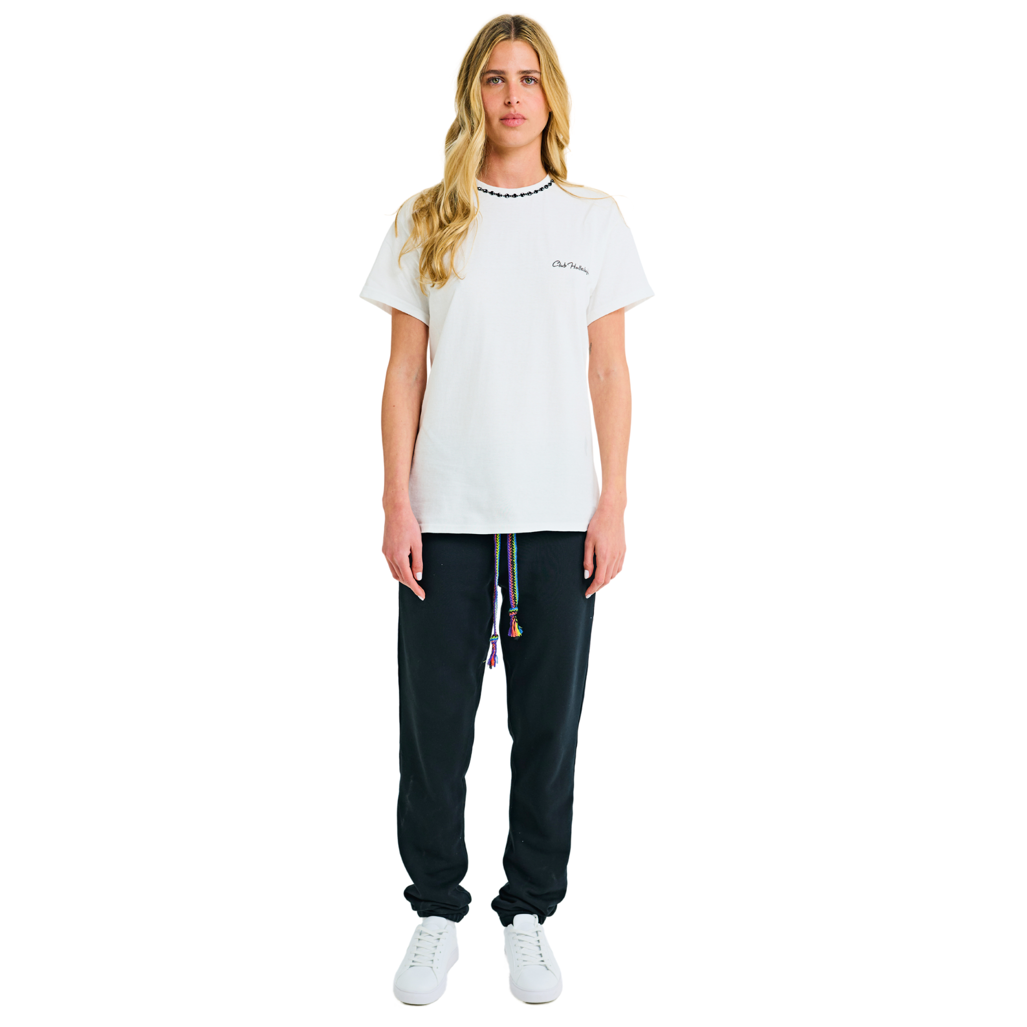 Female model wearing white T-shirt with small front logo and braided neckline, front view