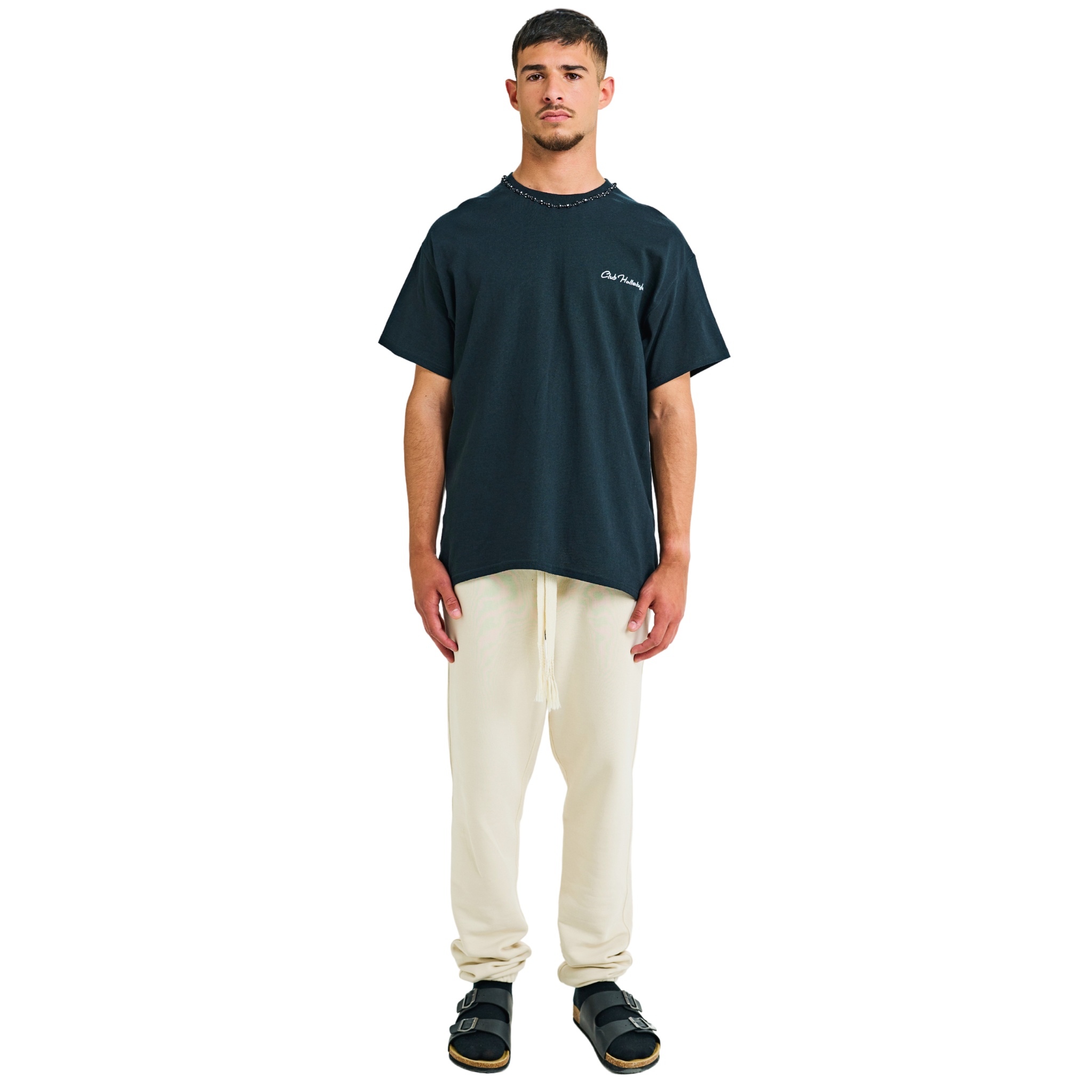 Male model wearing black T-shirt with small 'Club Hallelujah' front logo and braided neckline, front view