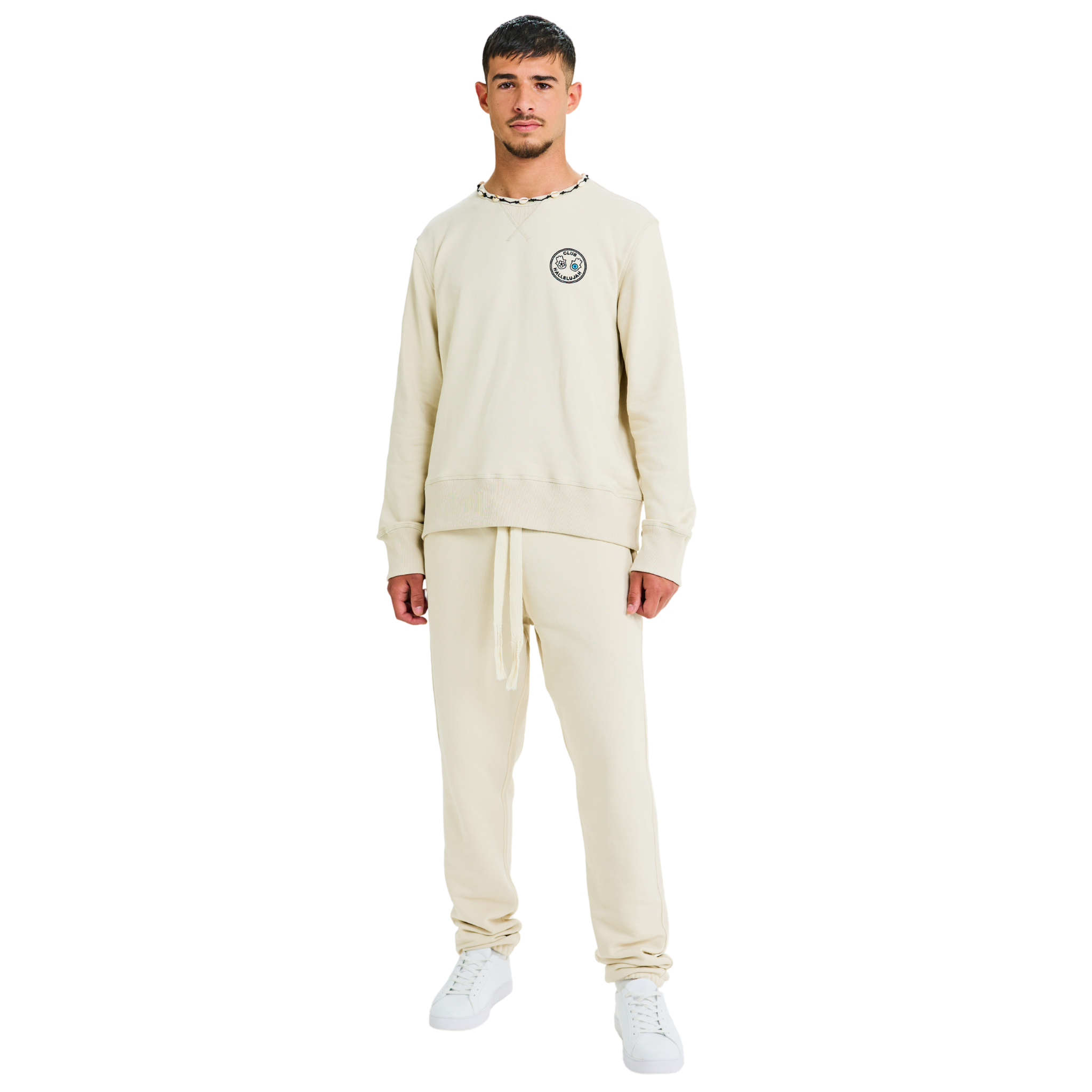 Front view of male model wearing unisex stone sweatshirt with embroidered logo and braided shell-trimmed neckline
