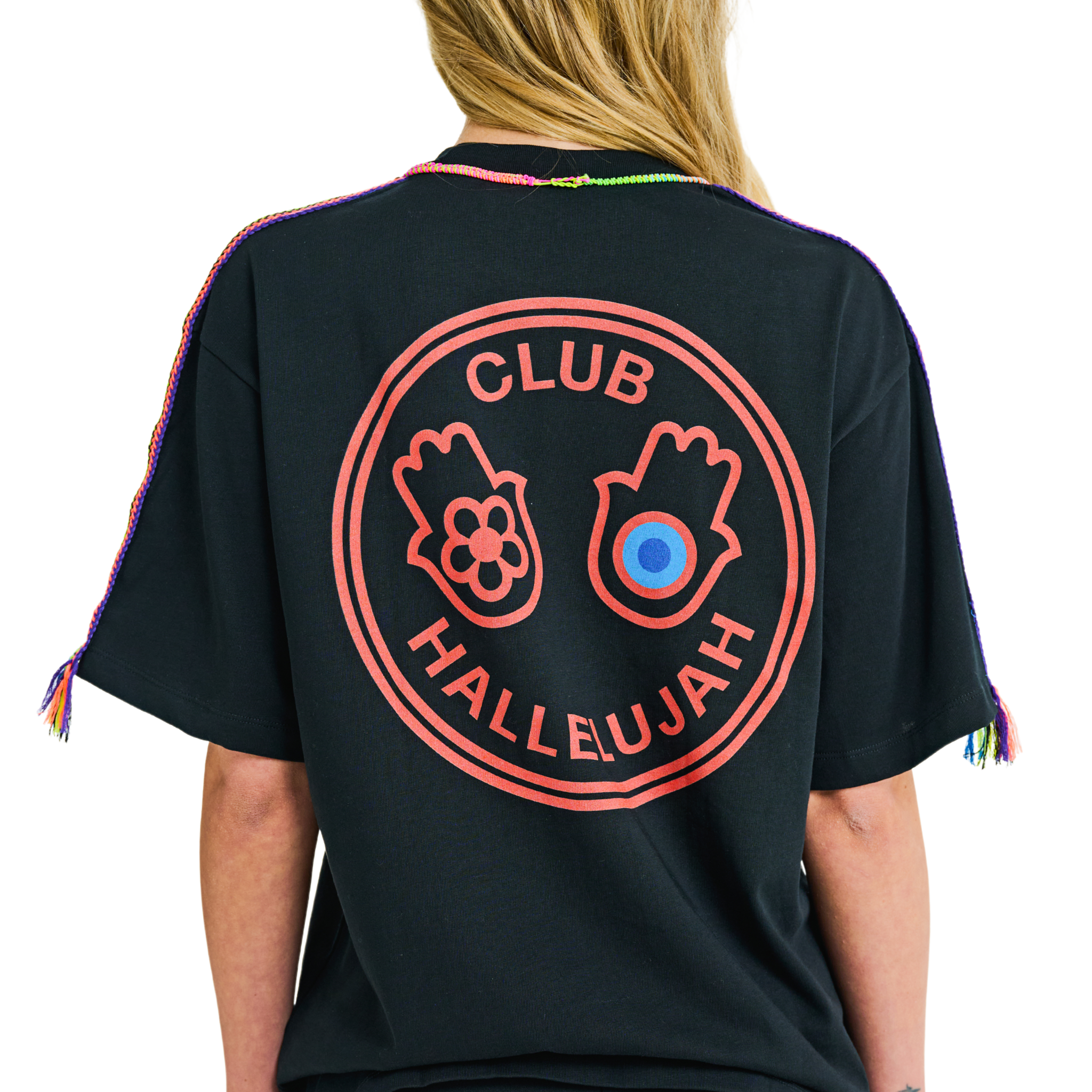 Back view of female model in black oversized T-shirt with printed graphic logo and braided shoulder details