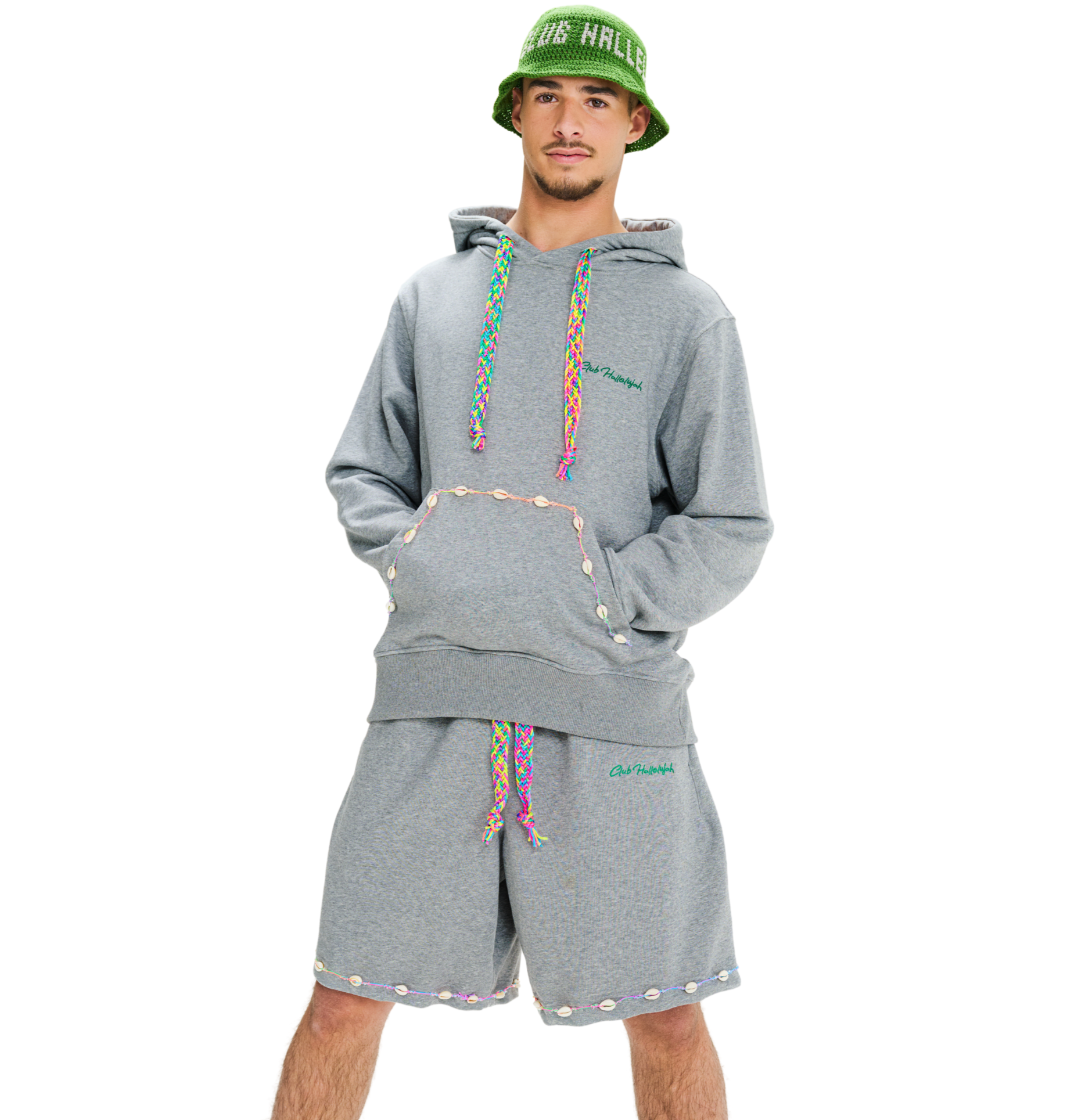 Front view of male model wearing unisex grey hoodie with embroidered kangaroo pocket and colorful hand-woven drawstring