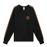 Front view of black oversized raglan sweatshirt with embroidered logo and handmade braided sleeves