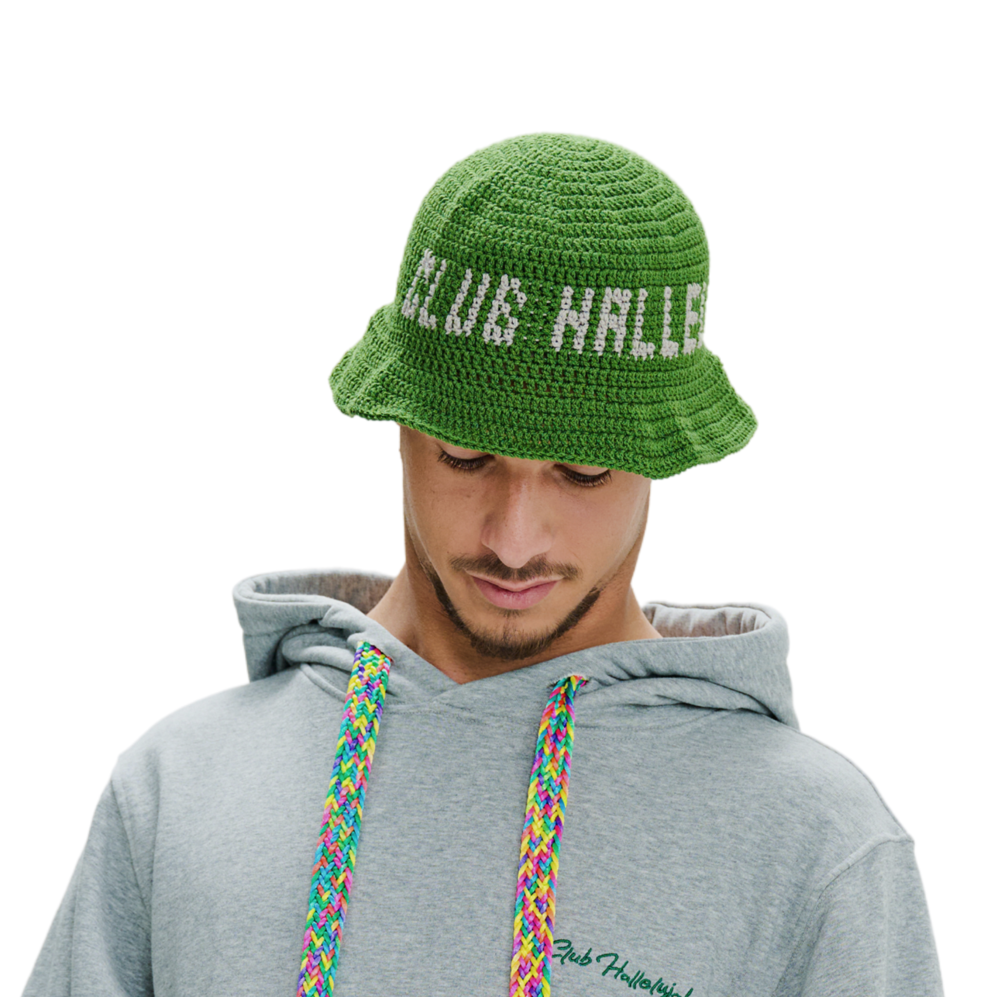 Female model wearing green crochet bucket hat with 'Club Hallelujah' text, front view