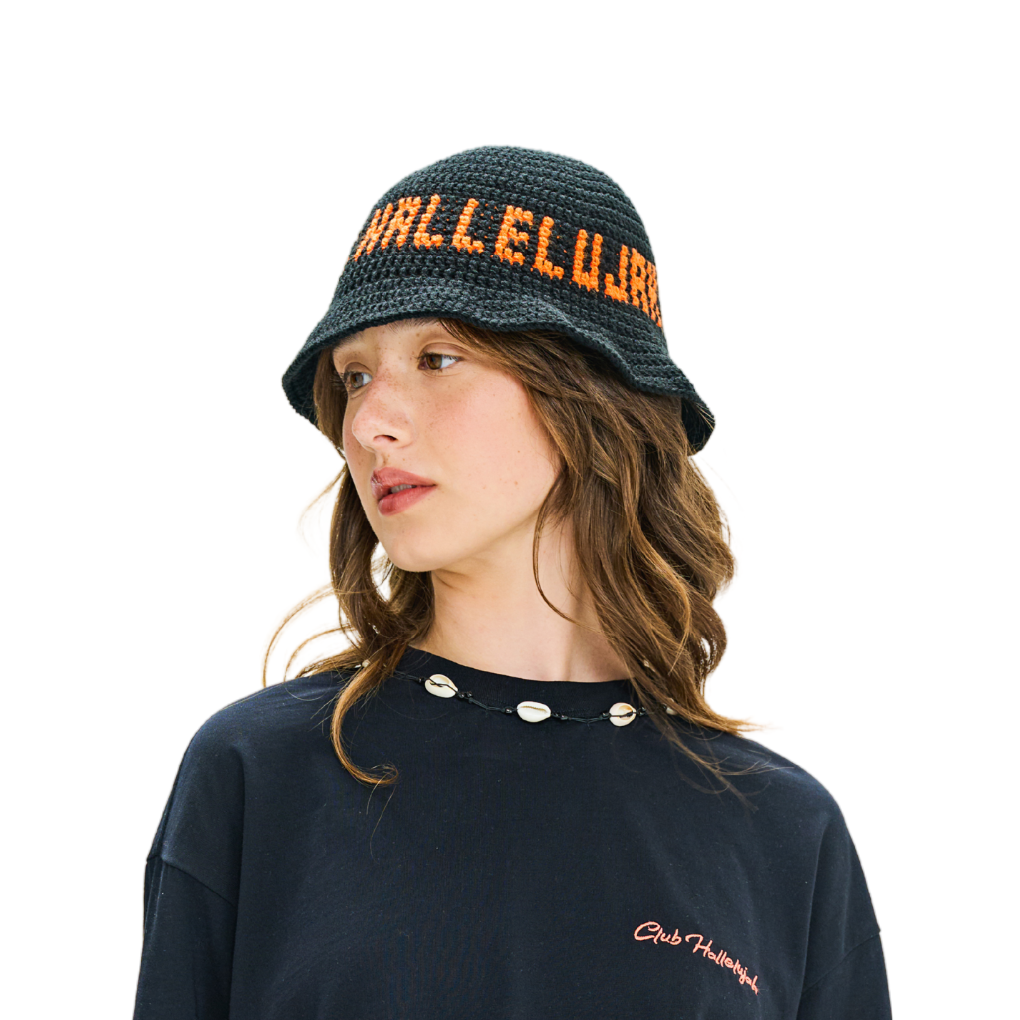 Model wearing black crocheted bucket hat with orange 'CLUB HALLELUJAH' text, side view