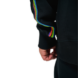 Close-up of hand-braided colorwork detail on sweatshirt sleeve