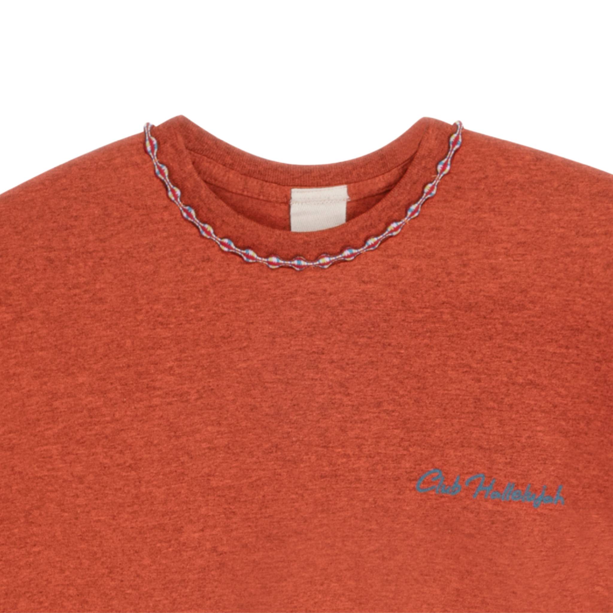 Close-up of orange mélange T-shirt neckline with handmade braided ribbon and small front logo