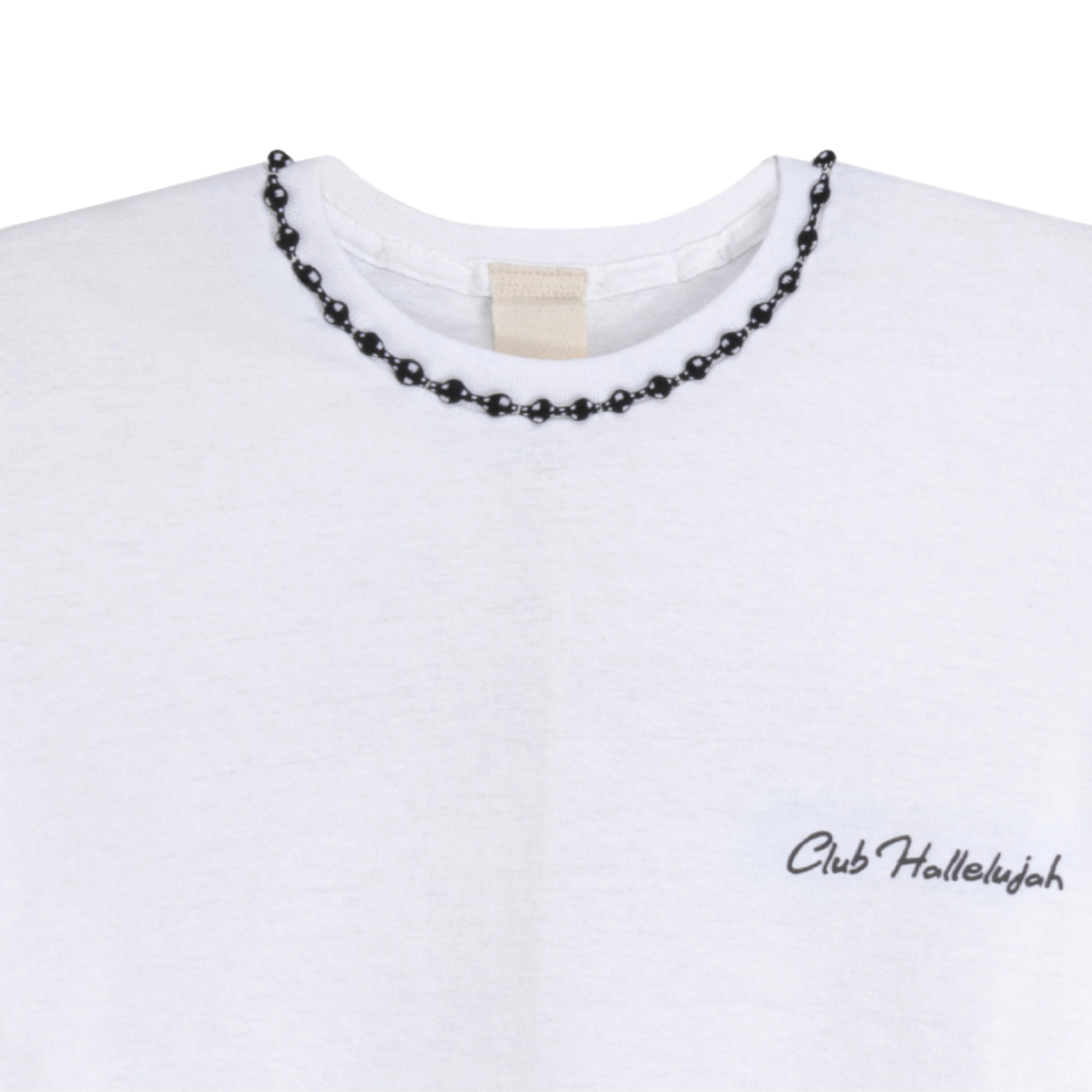 Close-up of white T-shirt neckline with handmade braided ribbon and small 'Club Hallelujah' logo