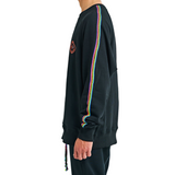 Close-up of hand-braided colorwork detail on sweatshirt sleeve