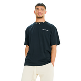 Front view of male model wearing unisex black oversized T-shirt with embroidered logo and braided shell neckline